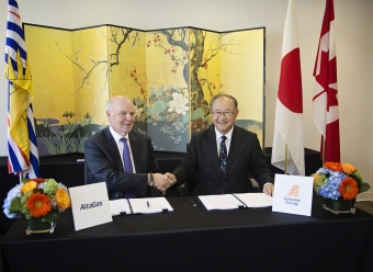 David Cornhill, Chairman and Founder, AltaGas and Osamu Masuda, President Astomos Energy celebrate the signing of an agreement for the sale and purchase of LPG from the Ridley Island Propane Export Terminal currently under construction