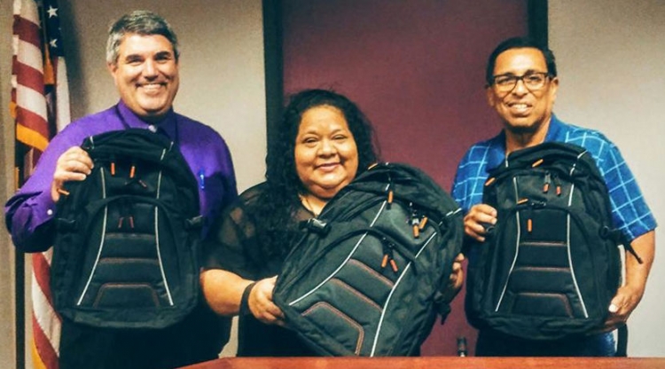 On Aug. 9, AltaGas' Administrative Assistant Olivia Lopez said she was very happy to play a part in the company giving back to the community and providing students with supplies that will start them off for what she hopes is a great school year. Pictured with Lopez is Superintendent Charles Bush (left) and board President Sonny Hernandez (right). (Photo by Cathyleen Rice/Palo Verde Unified School District)